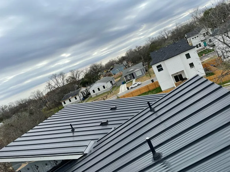 Standing seam metal roof panels with vents for Skylight Repair in Kingston